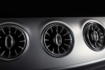 Poster - Luxury car air conditioning system intakes at the panel