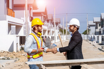Poster - Engineer man handshake with businessman after finishing up meeting in construction site,Hand shake concept.
