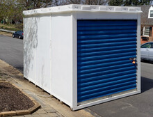 Temporary Storage Unit At Curbside In Residential Neighborhood.
