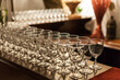 Wine glasses on a table at a catered event