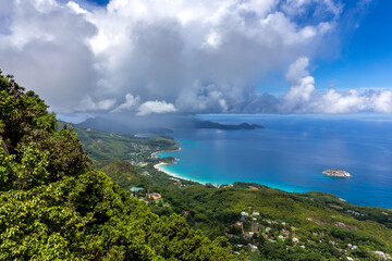 Wall Mural - Landscape of Mahe Island, Seychelles, coastline from Morne Blanc View Point with lush tropical vegetation, crystal blue ocean and small tropical islands.