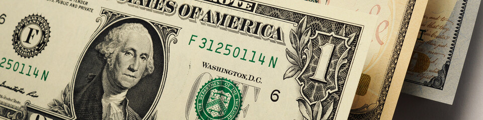 Wall Mural - u.s. money banknotes of 1, 10 and 100 dollars. banner or headline about the american dollar or econo