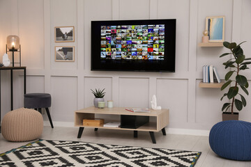 Poster - Stylish living room interior with modern TV on white wall