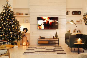 Canvas Print - Plasma TV on white wooden wall in living room beautifully decorated for Christmas