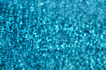 Wall Mural - Bokeh texture of shiny sparkling lurex fabric blue color.