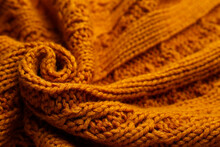 Beautiful Orange Knitted Fabric As Background, Closeup