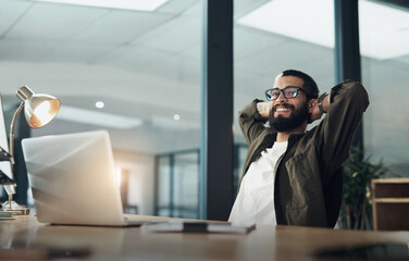 Poster - I gave it my all, I got it all. Shot of a young businessman taking a break while working late at night in a modern office.