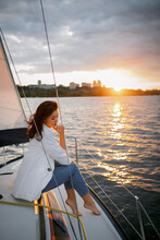 Bachelorette Party On A Yacht, A Beautiful Girl On A Walk Along The River. Setting Sun