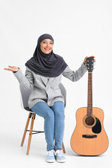 Sticker - Muslim music teacher with guitar on light background