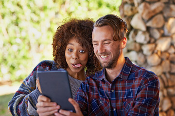 Poster - Just for laughs. Friends taking a selfie on a tablet.