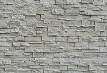 Wall Of Irregular Natural Stone Blocks In Shades Of White