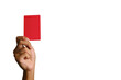 © NajmiArif - A picture of hand showing red card on copyspace white background. Law violation and misconduct concept.