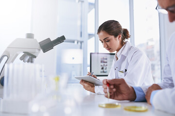 Aufkleber - its a high-tech workspace. shot of two scientists working in a lab.