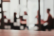 © .shock - Blurred photo of young multi-ethnic business people working and communicating together in creative office. Selective focus