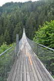 Fototapeta Mosty linowy / wiszący - long suspension bridge in the mountains in Kärnten, Austria on the 