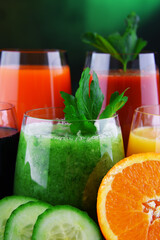 Wall Mural - Glasses with fresh organic vegetable and fruit juices