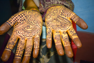 Closeup of Indian wedding mahendi ceremony.