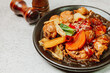 Andongjjimdak, Korean Braised Chicken : To make this dish, chicken is cut into pieces and braised with carrot, potato, and other vegetables, along with a soy sauce-based seasoning. Glass noodles can b