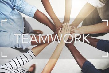 Poster - Teamwork leads to success. Cropped shot of a group of businesspeople joining their hands in solidarity.
