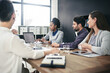 © Alexandra/peopleimages.com - Sharing her findings. Cropped shot of a group of businesspeople meeting in the boardroom.