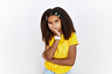 Poster - Young african american girl standing over white isolated background thinking looking tired and bored with depression problems with crossed arms.