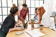 © Krakenimages.com - Group of business workers with serious expression working at the office