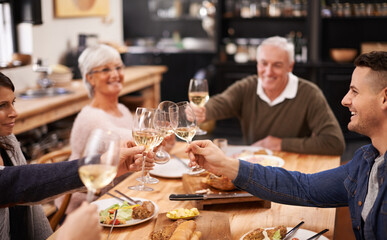 Sticker - Friends and family are the true gifts in life. Shot of a family sitting down to dinner.