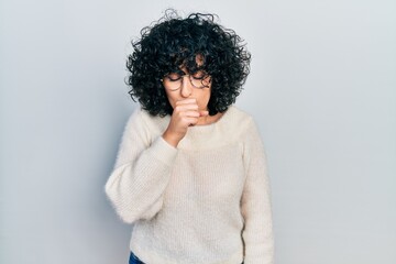 Poster - Young middle east woman wearing casual white tshirt feeling unwell and coughing as symptom for cold or bronchitis. health care concept.