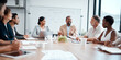 © Micah C/peopleimages.com - I have some ideas for you. Shot of a group of businesspeople having a meeting at work.