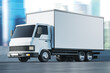 © ImageFlow - Delivery van moving on city background. Mockup