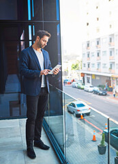 Aufkleber - Business time, anytime. Shot of a businessman using his tablet while standing on a balcony.