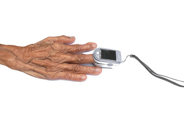 Hand of senior woman with test pulse Oximeter on Fingertip,old elderly measuring heart rate,TEST Oxygen saturation level in the blood,diagnosis of Coronavirus,COVID-19 at home,health care concept.