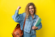 Young Student Caucasian Woman Isolated On Yellow Background Doing Strong Gesture