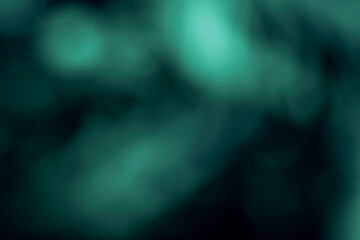 Aufkleber - Beautiful optical abstract green bokeh in the darkness  background.