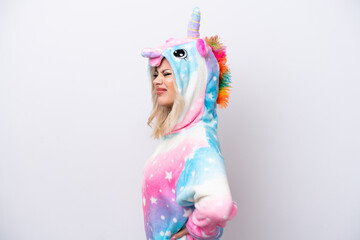 Wall Mural - Young Russian woman with unicorn pajamas isolated on white background suffering from backache for having made an effort
