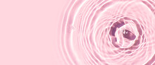 Drops On Pink Water Background Under Sunlight. Top View, Flat Lay. Banner