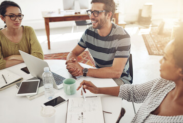 Poster - Ideas are flowing now. Shot of a group of coworkers having a meeting in an office.