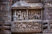 Figures Of King And His Consorts Along With The Royal Court And Elephant In The Ruins Of 800 Year Old Sun Temple Complex, Konark, India.  Unesco World Heritage  Site.
