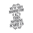 We've been Married for 42 years, Nothing scares us. 42nd anniversary celebration calligraphy lettering