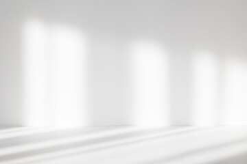 Wall Mural - Abstract white studio background for product presentation. Empty room with shadows of window. Display product with blurred backdrop. Soft focus