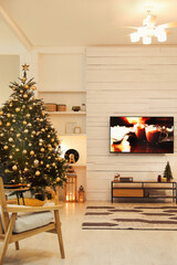 Sticker - Plasma TV on white wooden wall in living room beautifully decorated for Christmas