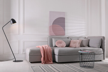 Wall Mural - Cozy living room interior with comfortable grey sofa and beautiful picture