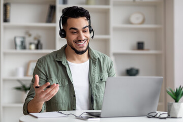Aufkleber - Teleconference Concept. Handsome Arab Guy In Headset Making Video Call With Laptop