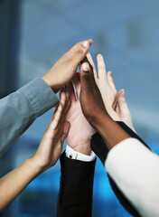 Poster - Together as one. Shot of a group of hands reaching up together.