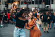 © Zamrznuti tonovi - Friends using smartphone and drinking beer on a music festival