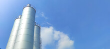 Flour Storage Silo Machine Before Production Use, Bright Blue Sky Background