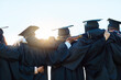 © Nola Viglietti/peopleimages.com - This is just the beginning. Rearview shot of a group of students standing in a row on graduation day.