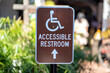 Brown Metal Accessible Restroom sign