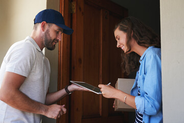 Poster - Our services are one of the easiest to use. Shot of a young woman using a digital tablet to sign for her delivery from the courier.