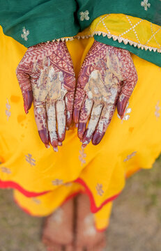 Traditional Haldi turmeric kept on a flower plate for the hindu marriage ceremony. This paste of sandal, oil and turmeric is applied by all relatives before the wedding to make the bride or groom.